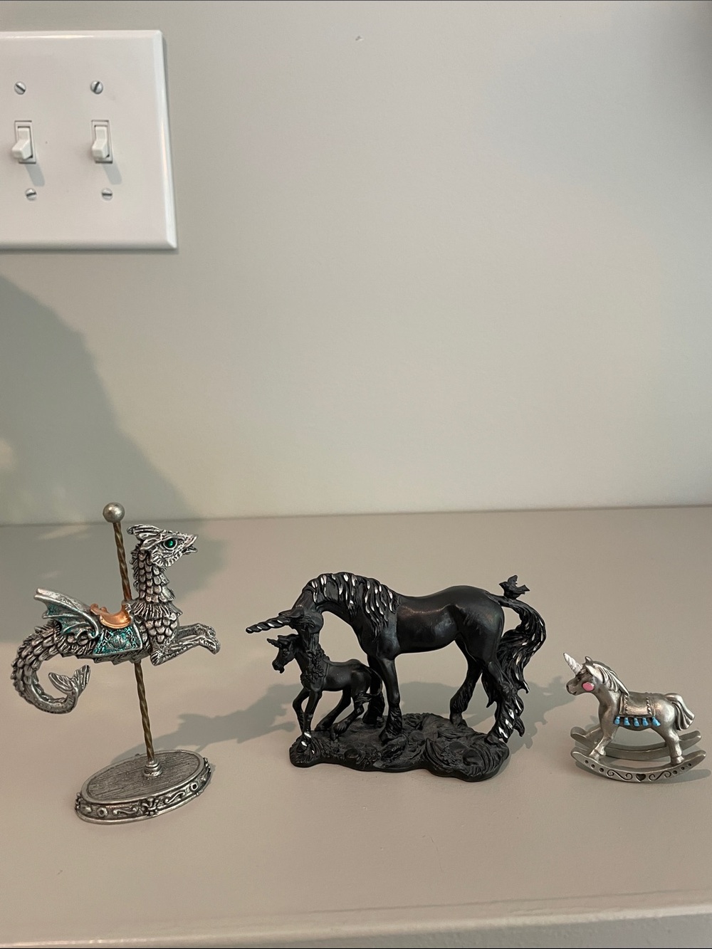 Two Hudson vintage unicorns and Rawohiffe pewter dragon